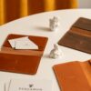 Leather Wallets on a White Table 